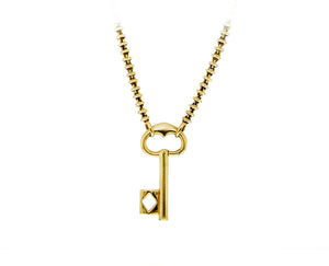 Geelgouden collier met Pomellato sleutelhanger