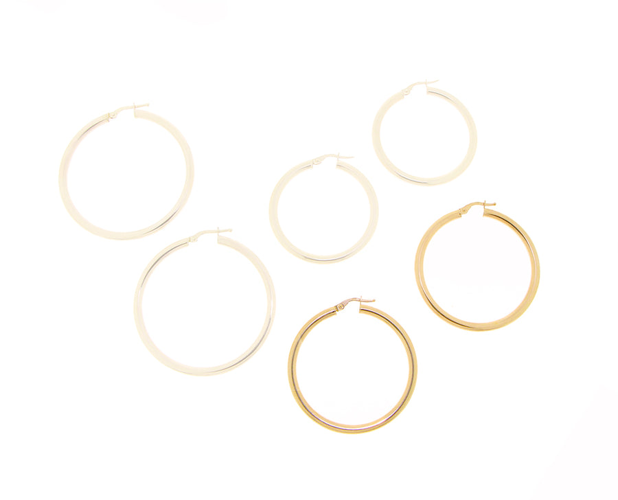 Yellow gold hoops in different sizes