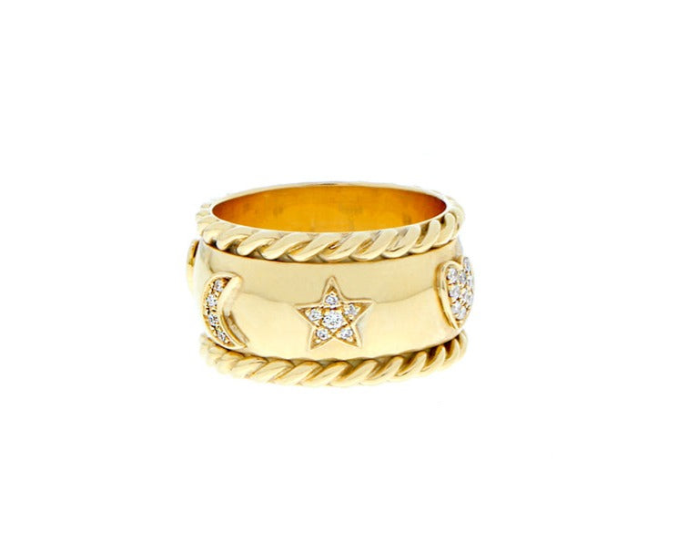 Yellow gold ring with diamond moon, heart and star