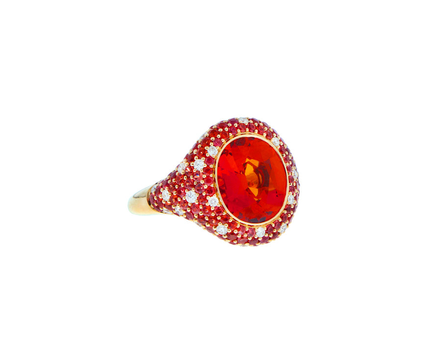 Yellow gold ring with a spessartite, diamonds and sapphires