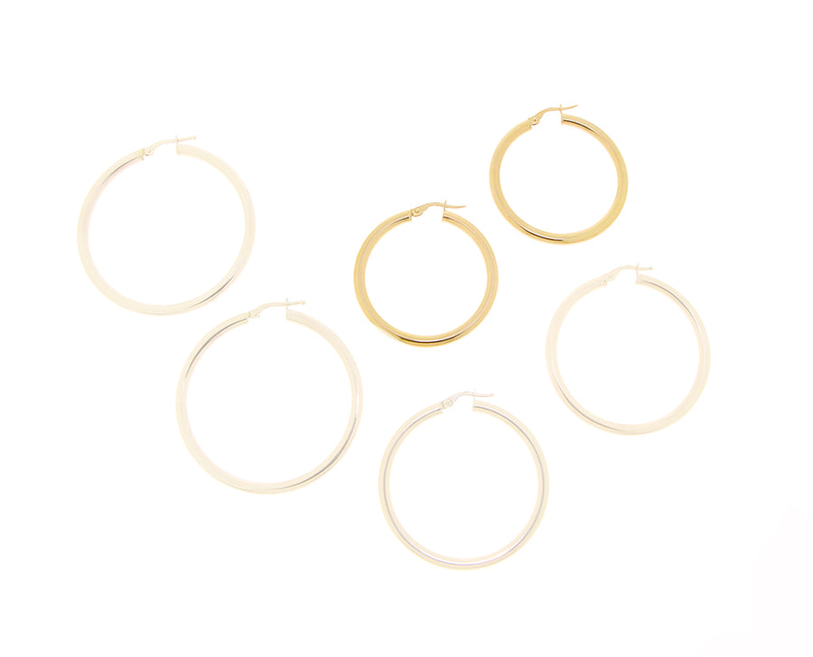 Yellow gold hoops in different sizes