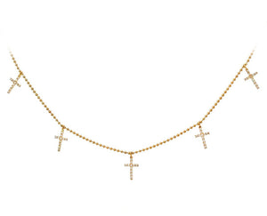 Yellow gold necklace with five small diamond cross charms