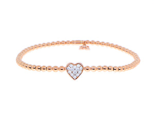 Rose gold ball bracelet with a diamond heart charm