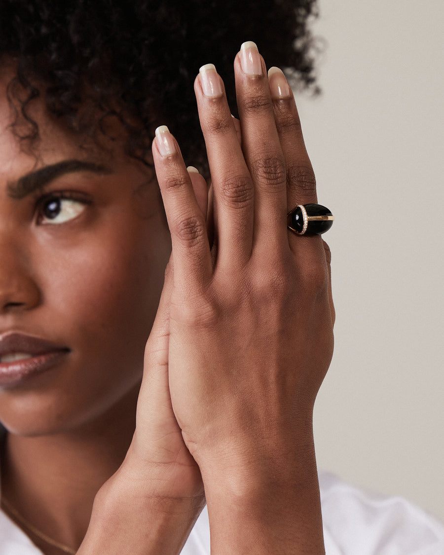 Gold ring with a malachite or tiger eye scarab