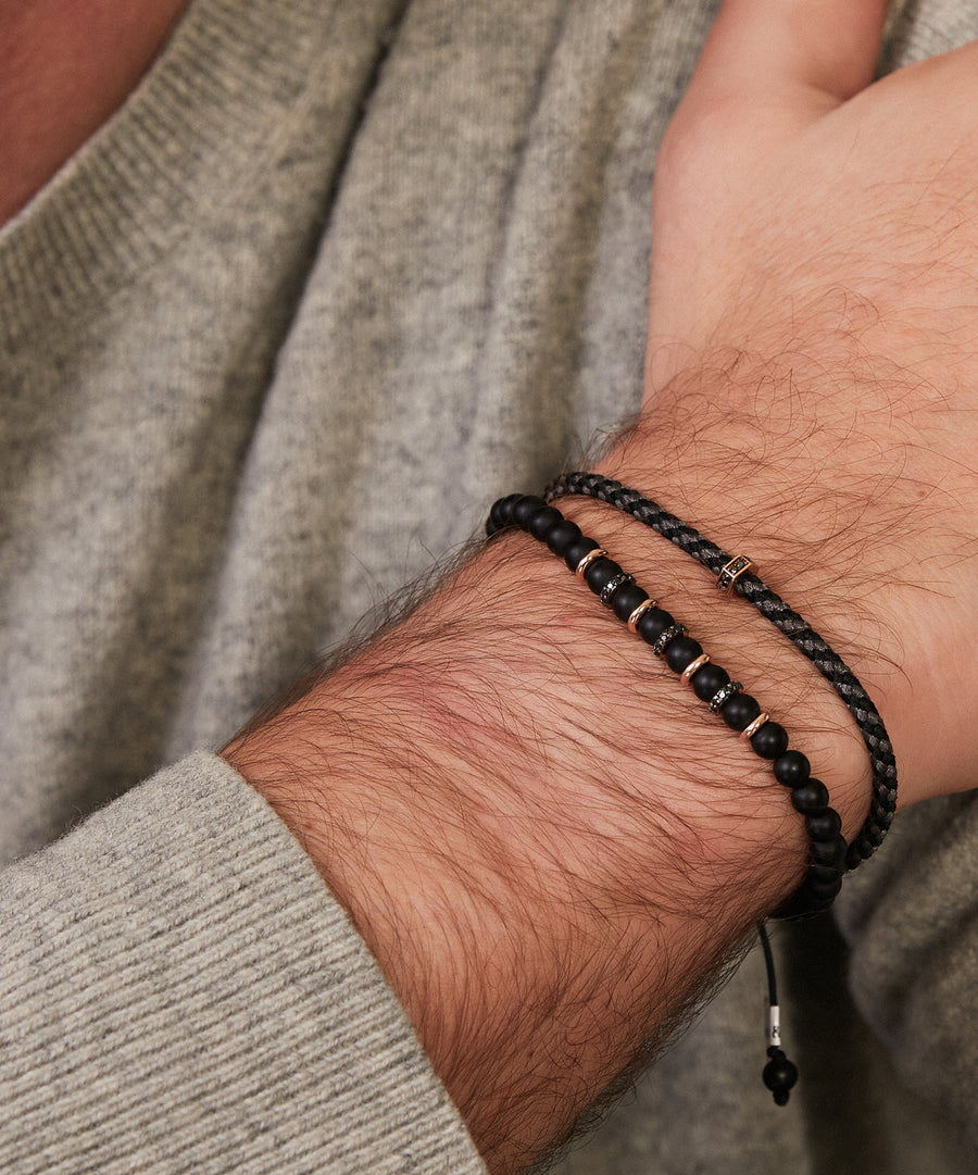 Rope bracelet with black steel ball rose gold elements with black diamonds