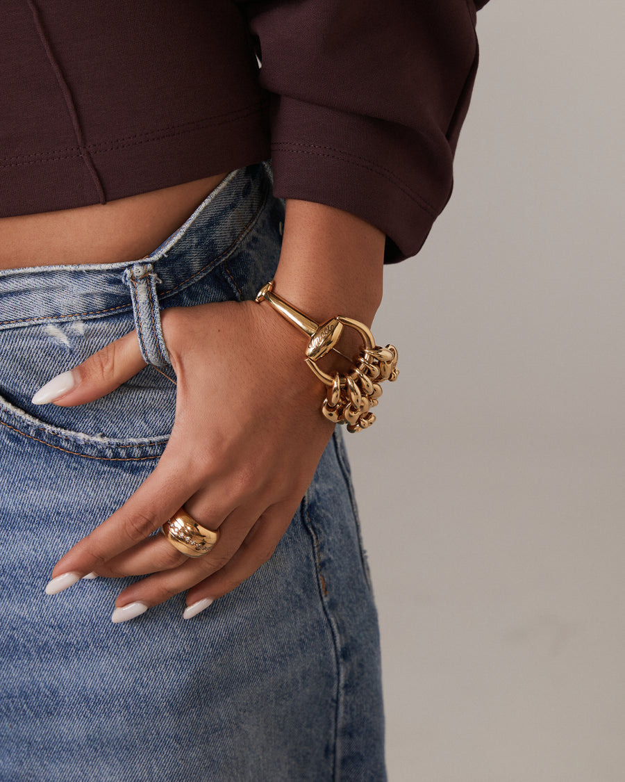 Yellow gold ring with a band of diamonds
