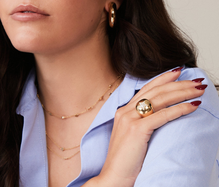 Yellow gold ring with a diamond star