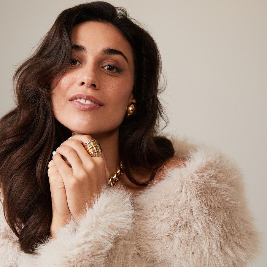 Yellow gold wide ribbed ring