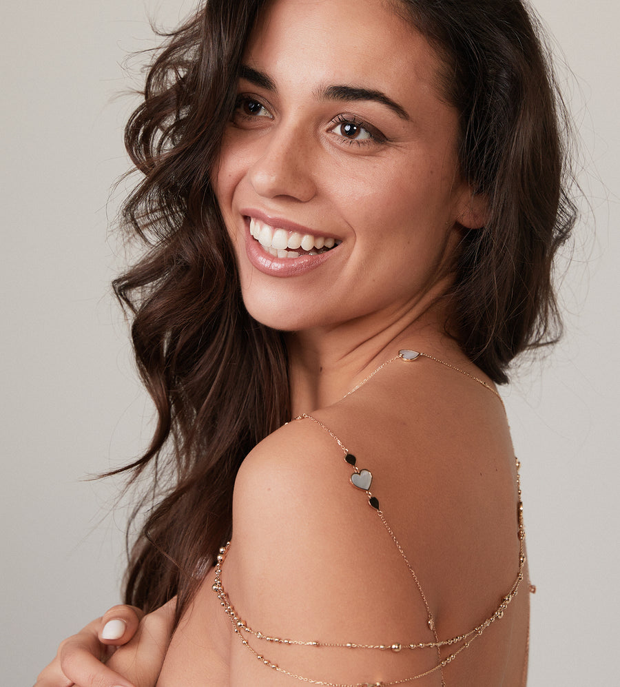 Yellow gold ball sautoir necklace with diamonds and mother of pearl hearts