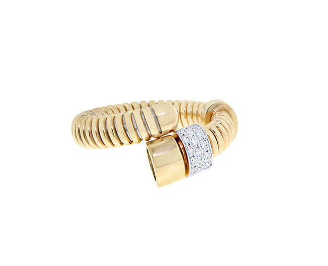 Yellow gold tubo ring with a flexible diamond element