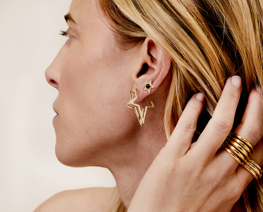 Yellow gold and diamond star earrings