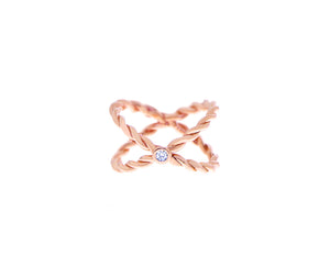 Twisted ring with a diamond