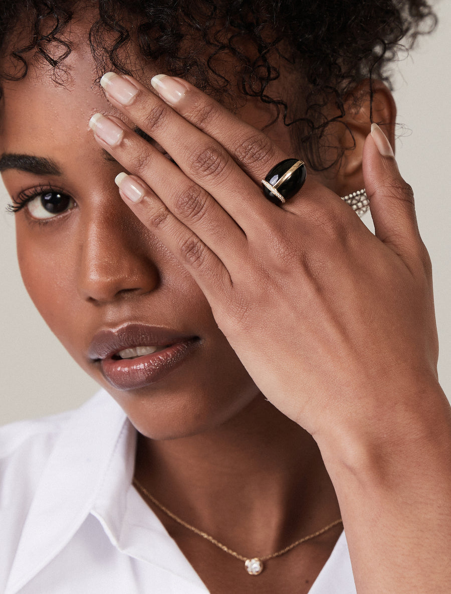 Yellow gold and diamond onyx scarab ring