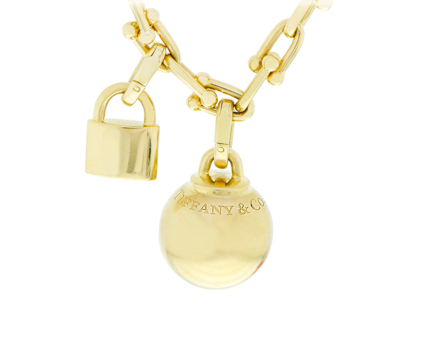 Yellow gold Tiffany necklace with detachable ball & lock charms