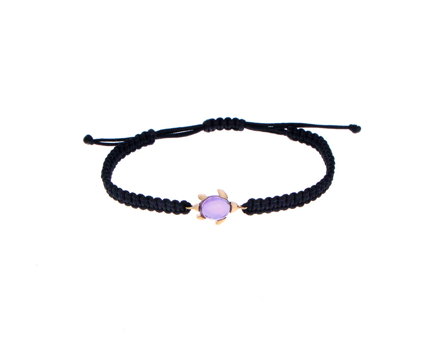 Knotted rope bracelets with a rose gold and gemstone turtle charm