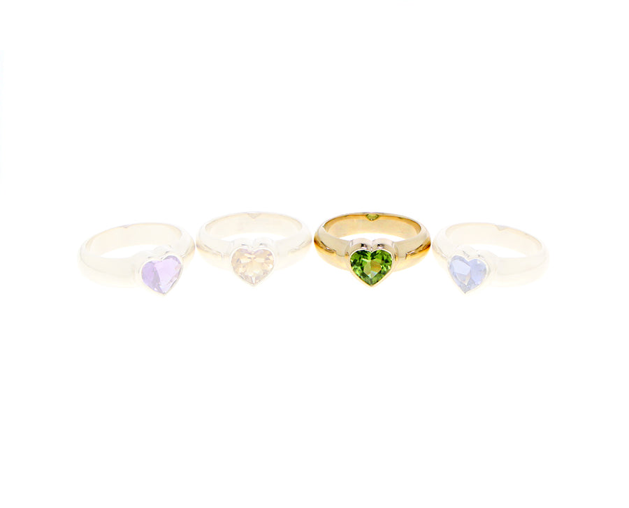 Yellow gold ring with a heart-shaped gem