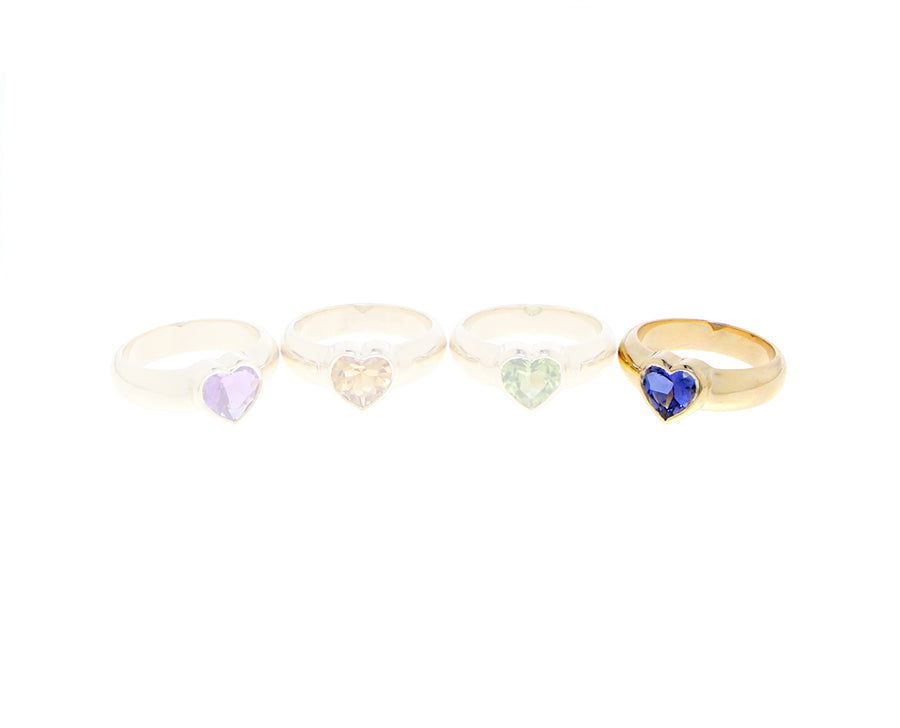 Yellow gold ring with a heart-shaped gem