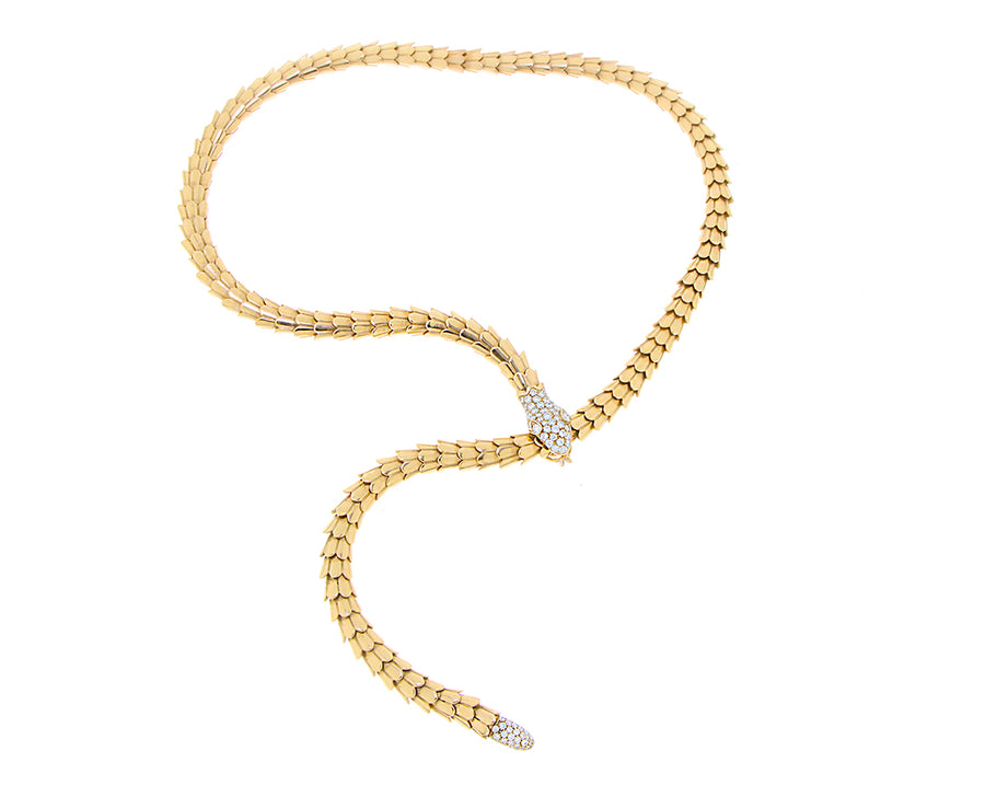 Yellow gold adjustable snake ring with diamonds