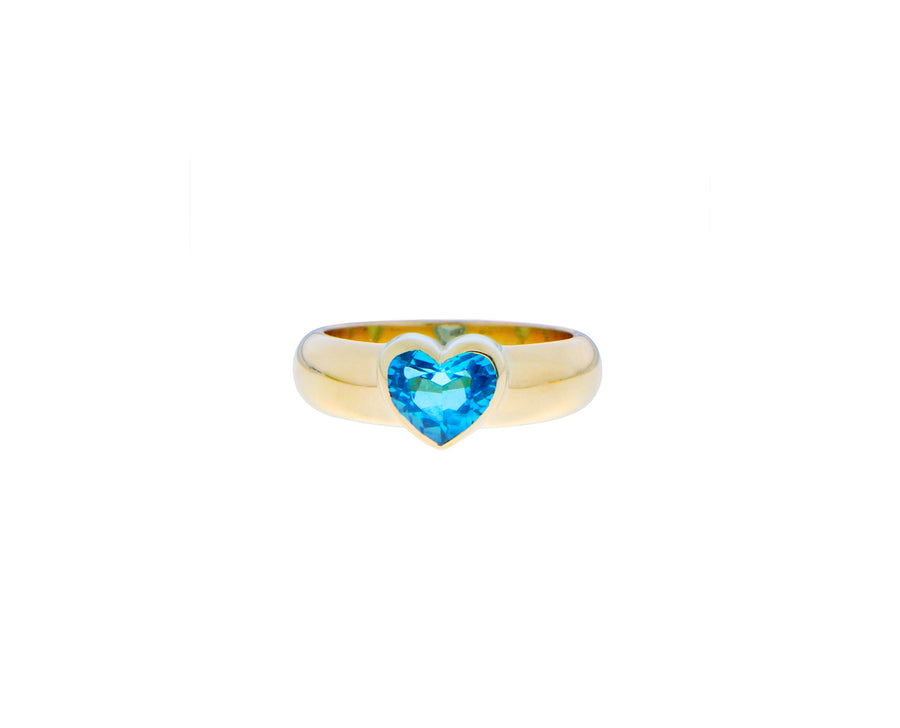 Yellow gold ring with a heart shaped green tourmaline, topaz or garnet