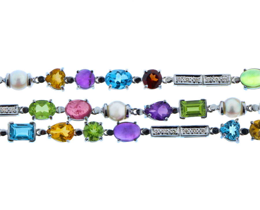 White gold bracelet with diamonds, pearls and a variety of gemstones