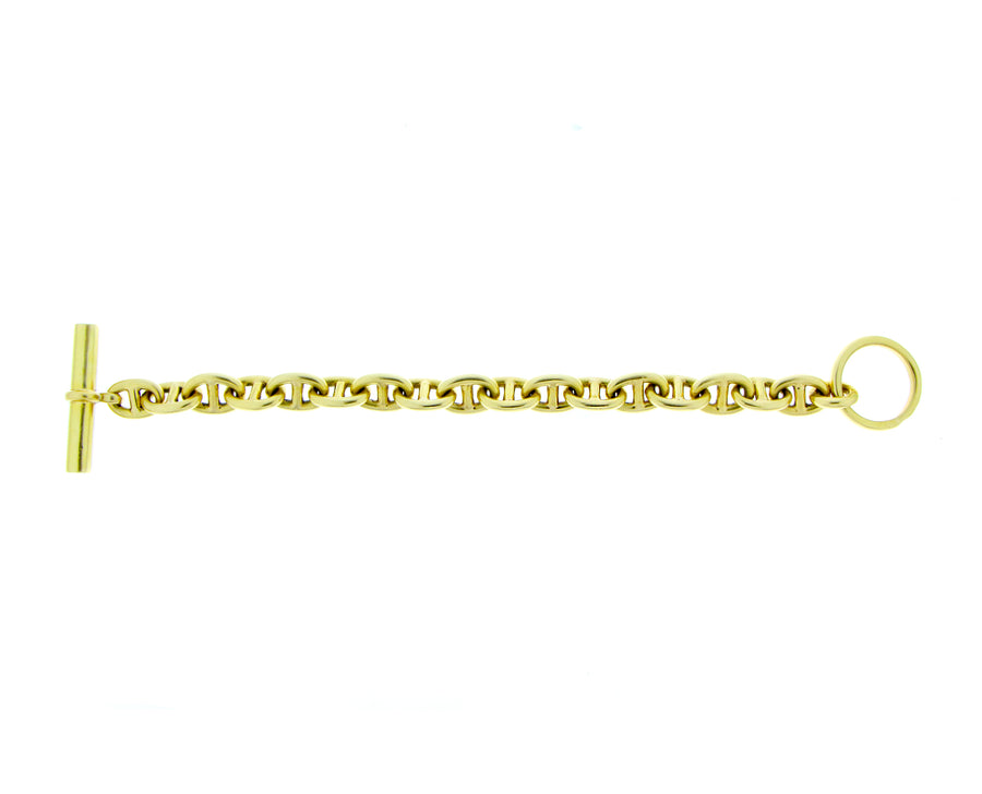 Yellow gold link bracelet with a toggle closure