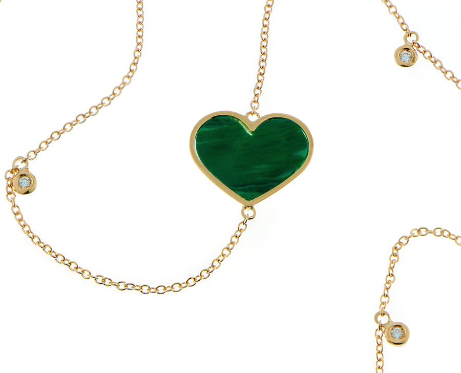 Yellow gold necklace with diamonds and malachite hearts