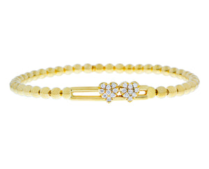 Yellow gold flexible bracelet with two diamond hearts