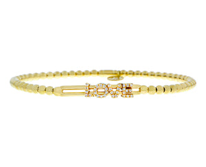 Yellow gold flexible bracelet with diamond letters