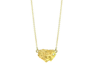 Yellow gold necklace with a gold nugget