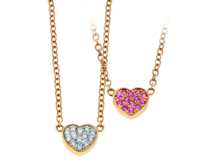 Rose gold necklace with a diamond and pink sapphire heart