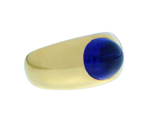 Yellow gold ring with an oval cabochon cut tanzanite