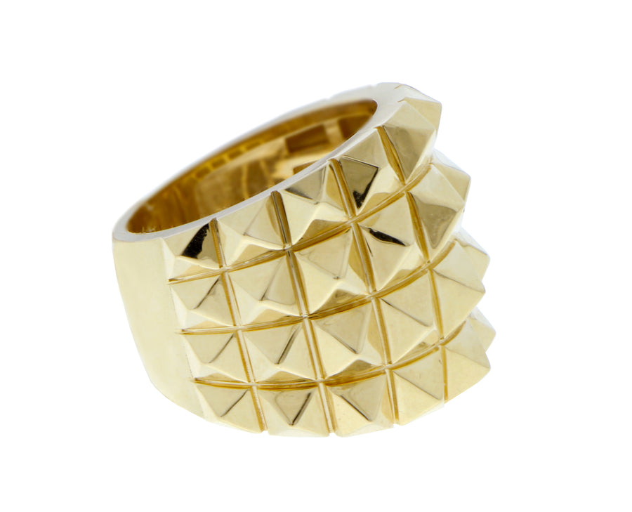Yellow gold ring with four rows of studs