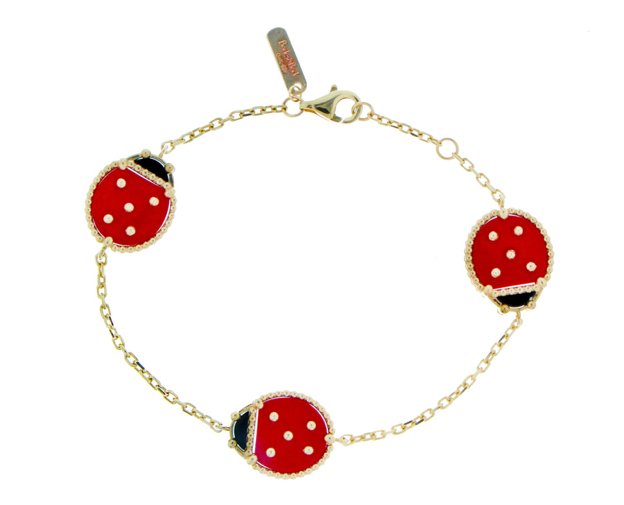 Yellow gold bracelet with three ladybugs