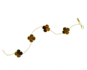 Yellow gold bracelet with 4 tigereye clovers