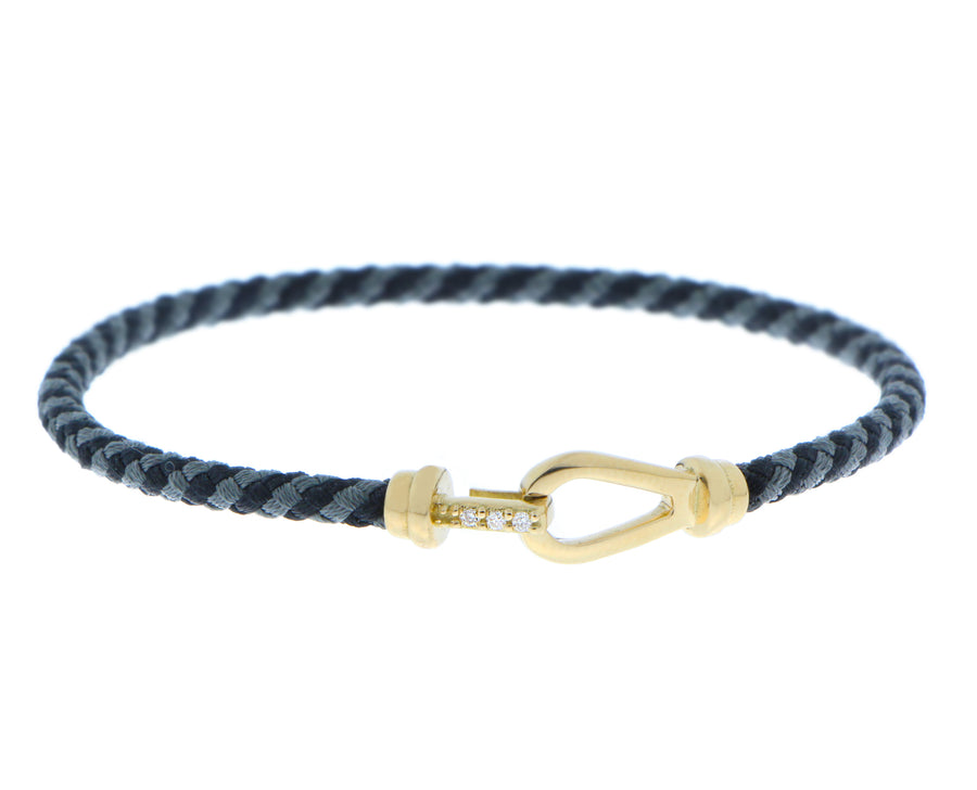 Rope bracelet with a gold and diamond closure
