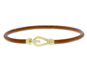Leather bracelet with a yellow gold and diamond closure