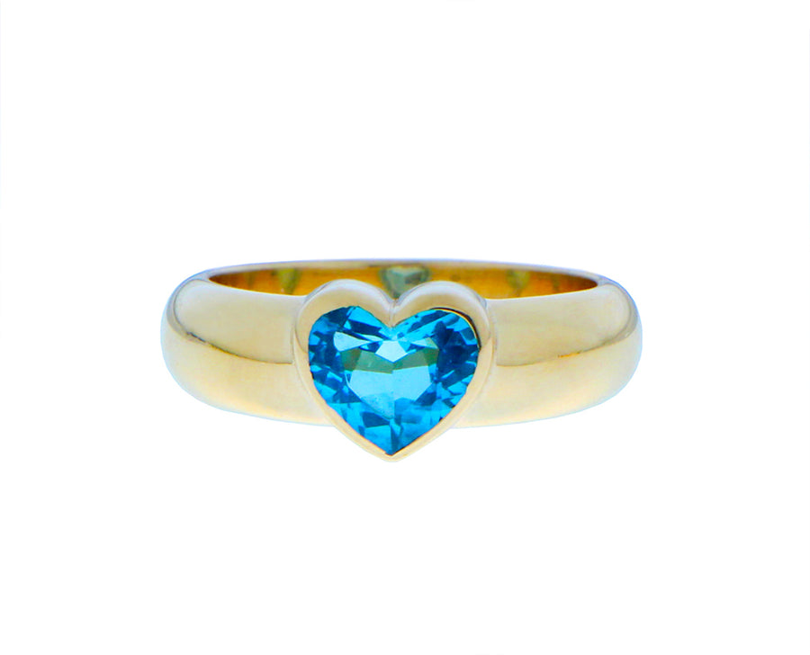 Yellow gold ring with a heart shaped green tourmaline, topaz or garnet