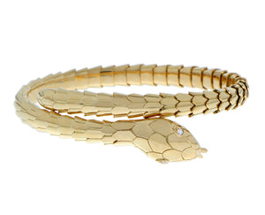 Yellow gold snake bracelet with diamond eyes
