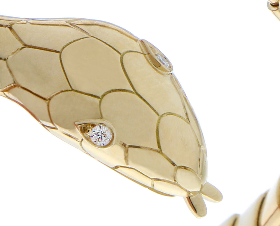 Yellow gold snake bracelet with diamond eyes