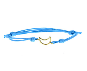 Light blue rope bracelet with a yellow gold moon charm