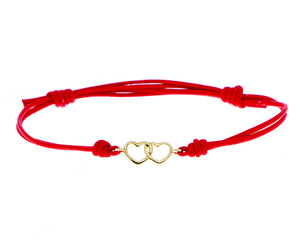Red rope bracelet with yellow gold hearts charm
