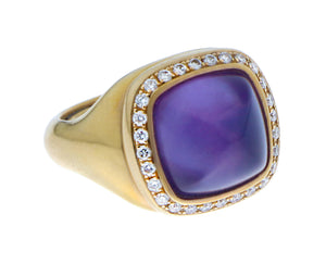 Rose gold ring with diamonds and an amethyst