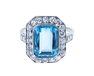 Platinum ring with blue topaz and diamonds