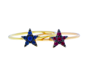 Rose gold ring with a star of rubies and a yellow gold ring with a star of sapphires