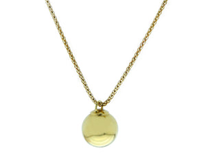 Yellow gold necklace with a gold ball pendant