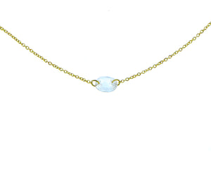 Yellow gold necklace with a white sapphire