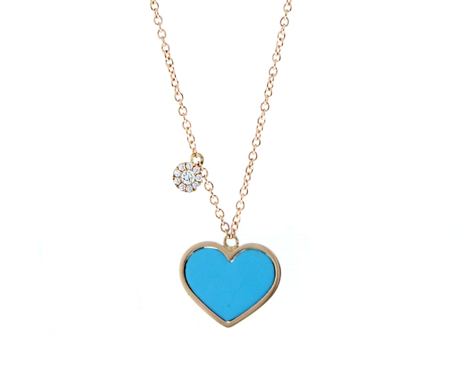 Rose gold necklace with a coral heart and a pendant set with diamonds