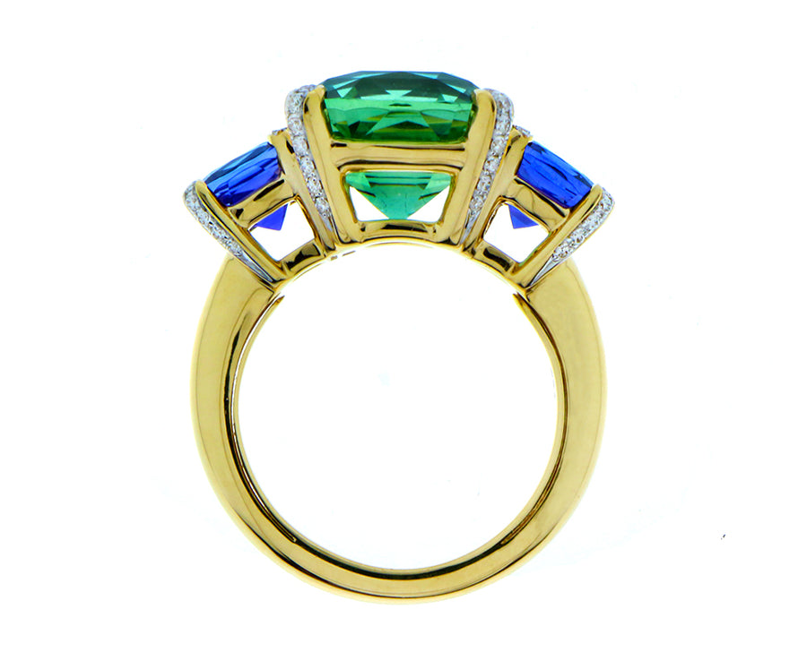 Yellow gold ring with a green tourmaline and tanzanites