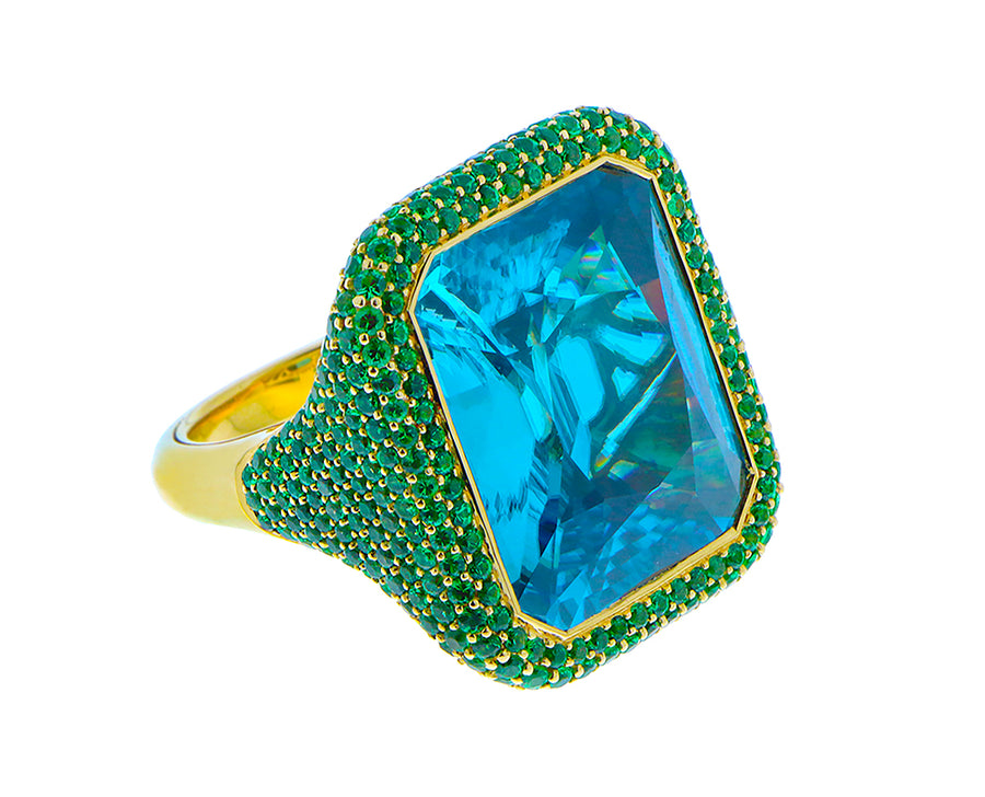 Yellow gold ring with a blue zircon and tsavorites