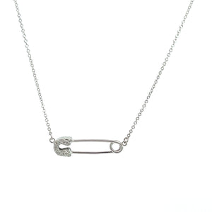 White gold necklace with a diamond safety pin charm